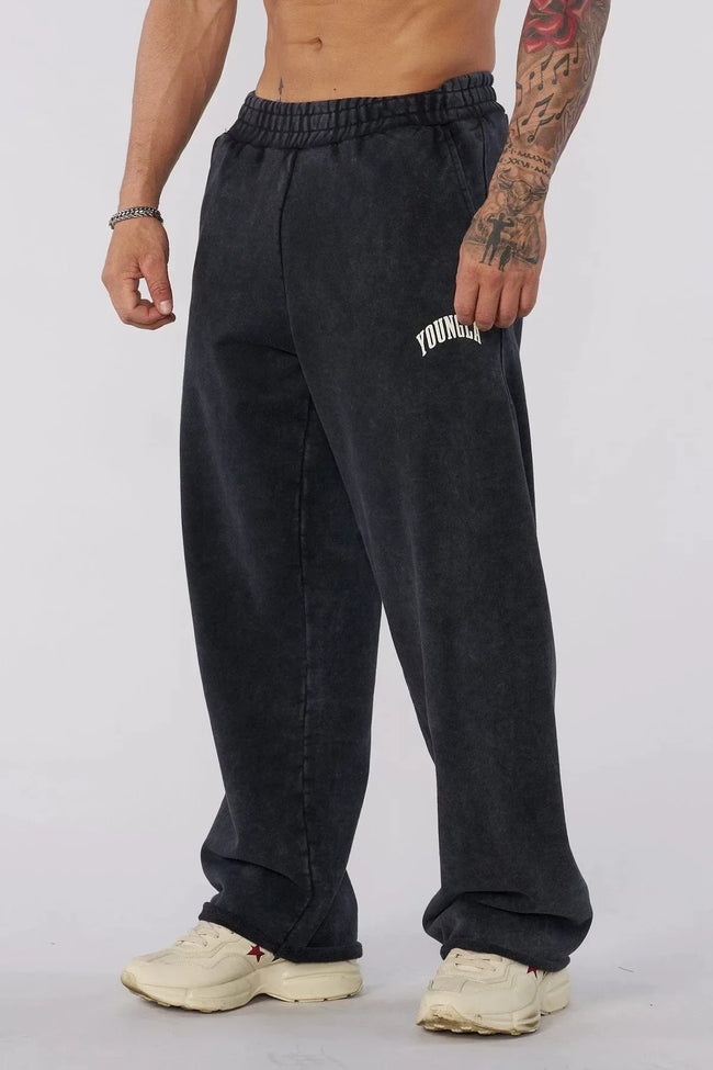 YOUNGLA Men's Arched Collegiate Logo Acid Wash Wide Leg Sweatpants Hover Image